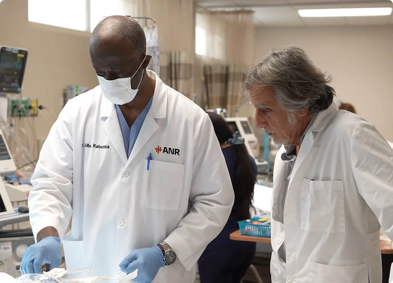 Dr. Waismann with a physician during an ANR procedure